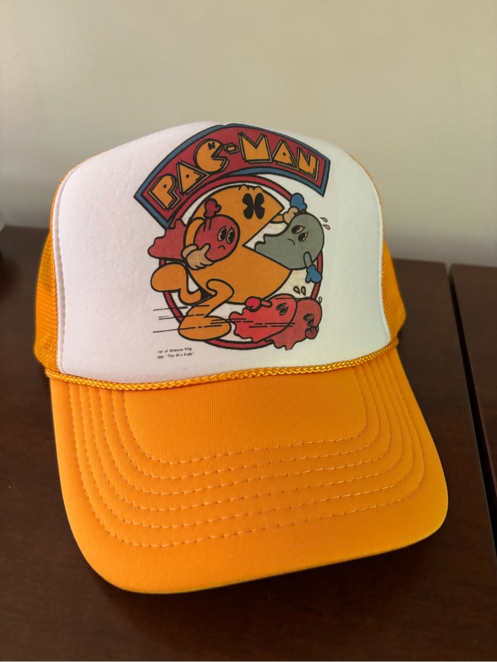 1981 Midway Pac-Man trucker snapback hat with an yellow orange mesh back